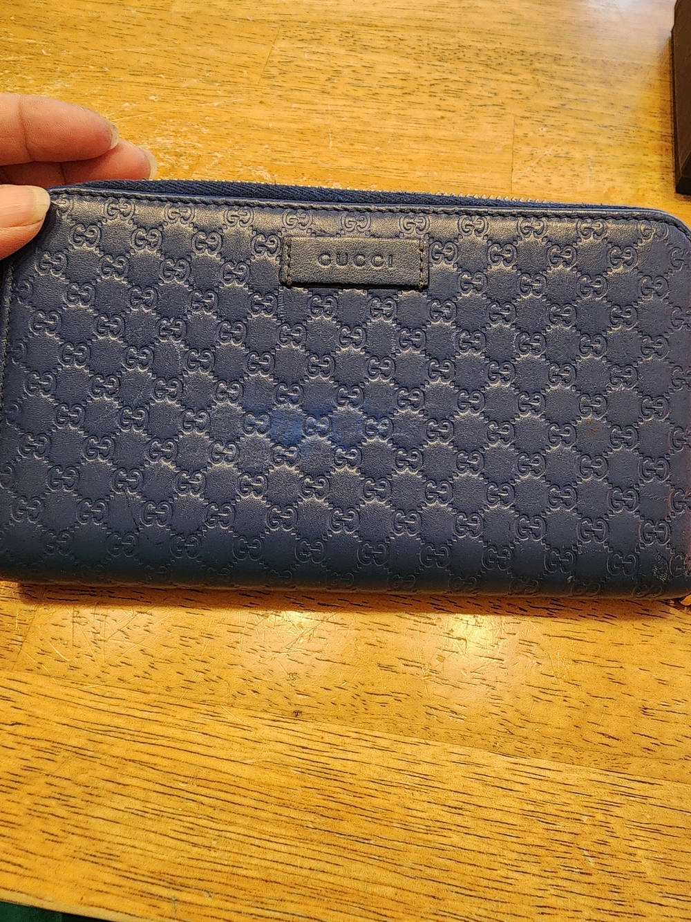 blue Gucci Guccissima zip-around wallet monogram-embossed calfskin leather